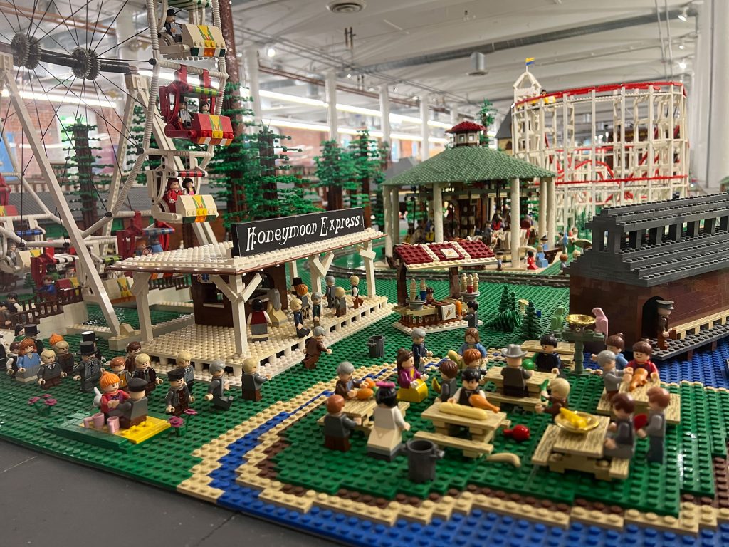 a stage and food court area | The LEGO® Millyard Project at SEE Science Center in Manchester, NH